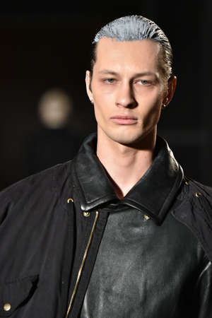 NEW YORK, NY - FEBRUARY 02: A model walks the runway wearing Robert Geller during New York Fashion...