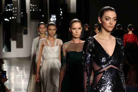 NEW YORK, NY - FEBRUARY 12: Models walk the runway finale at Pamella Roland fashion show during Fall...