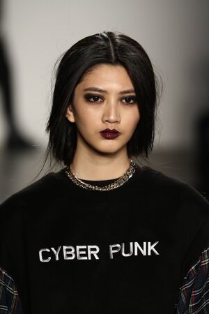 NEW YORK, NY - FEBRUARY 12: A model walks the runway wearing iiJin Fall 2016 during New York Fashion Week on February 12, 2016 in New York City.のeditorial素材