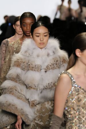 NEW YORK, NY - FEBRUARY 16: Models walk the runway wearing Dennis Basso Fall 2016 during New York Fashion Week on February 16, 2016 in NYC.のeditorial素材