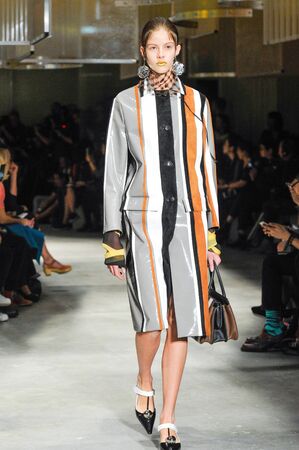 MILAN, ITALY - SEPTEMBER 24: A model walks the runway during the Prada fashion show as part of Milan...