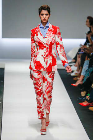 MILAN, ITALY - SEPTEMBER 26: A model walks the runway during the Ermanno Scervino show as a part of Milan Fashion Week Spring/Summer 2016 on September 26, 2015 in Milan, Italy.のeditorial素材