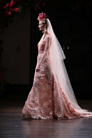 NEW YORK, NY - OCTOBER 09: A model walks the runway during the Naeem Khan Fall/Winter 2016 Couture Bridal Collection at Naeem Khan Showroom on October 9, 2015 in NYC.のeditorial素材