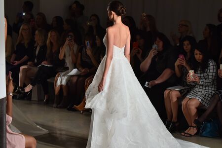 NEW YORK, NY - OCTOBER 09: A model walks the runway during the Amsale Fall/Winter 2016 Couture Bridal Collection runway show on October 9, 2015 in New York City.のeditorial素材