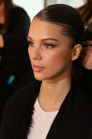 NEW YORK, NY - APRIL 14: A model getting ready backstage during the Anne Barge Bridal Spring/Summer...