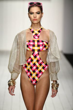 MIAMI, FL - JULY 16: Models grace the catwalk in designer swim apparel during the Art Institute's fashion show for Miami Swim Week on July 16, 2015のeditorial素材