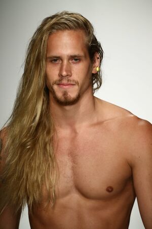 MIAMI, FL - JULY 16: A model walks runway in designer swim apparel during the MisterTripleX fashion show for Miami Swim Week on July 16, 2015のeditorial素材