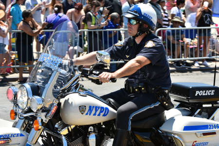 NEW YORK - JUNE 18, 2016: NYPD working during the 34th Annual Mermaid Parade at Coney Island, the...