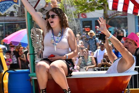 NEW YORK - JUNE 18, 2016: Participants march in the 34th Annual Mermaid Parade at Coney Island, the...