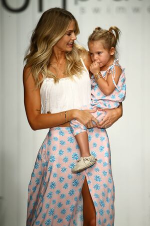 MIAMI, FL - JULY 18: Designer Tori Praver and her daughter walks runwayl during the Tori Praver Swimwear fashion show at Funkshion tent for Miami Swim Week on July 18, 2015のeditorial素材