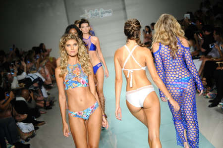 MIAMI, FL - JULY 16: Models walk the runway finale during Luli Fama Spring Summer 2017 Runway Show at Funkshion Sunset venue on July 16, 2016 in Miami Beach, FLのeditorial素材