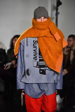 NEW YORK, NY - JANUARY 31: A model walks the runway wearing N. Hoolywood during NYFW: Mens on...