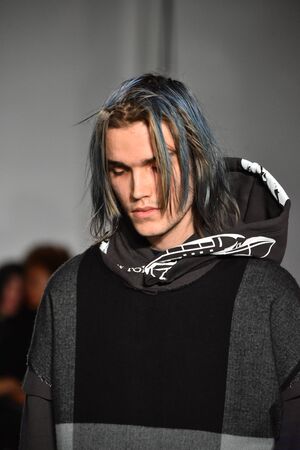 NEW YORK, NY - JANUARY 31: A model walks the runway wearing N. Hoolywood during NYFW: Mens on...