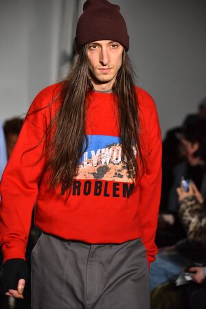 NEW YORK, NY - JANUARY 31: A model walks the runway wearing N. Hoolywood during NYFW: Mens on...