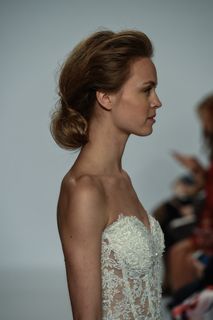 NEW YORK, NY - APRIL 20: A model walks the runway at the Randy Fenoli Spring/Summer Bridal 2018 show at  Kleinfeld Hotel on April 20, 2017 in New York City.のeditorial素材