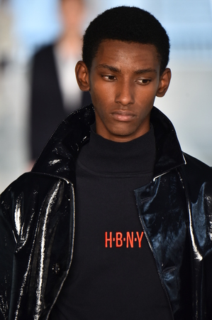 NEW YORK, NY - JULY 11: A model walks the runway at the BOSS - Hugo Boss show during NYFW Mens Spring Summer 2018 at 11 Fulton street on July 11, 2017 in New York City.のeditorial素材