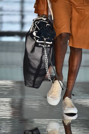 NEW YORK, NY - JULY 11: A model walks the runway at the BOSS - Hugo Boss show during NYFW Mens Spring Summer 2018 at 11 Fulton street on July 11, 2017 in New York City.のeditorial素材
