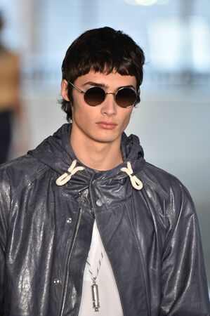 NEW YORK, NY - JULY 11: A model walks the runway at the BOSS - Hugo Boss show during NYFW Mens Spring Summer 2018 at 11 Fulton street on July 11, 2017 in New York City.のeditorial素材