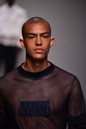 NEW YORK, NY - JULY 11: A model walks the runway during theFeng Chen Wang Runway show, NYFW: Men's July 2017 at Skylight Clarkson Sq on July 11, 2017 in New York City.のeditorial素材