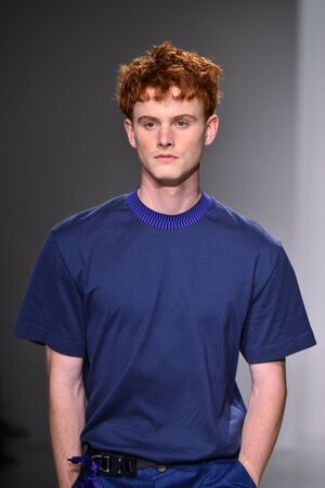 NEW YORK, NY - JULY 11: A model walks the runway at the Patrik Ervell show during NYFW: Mens July 2017 at Skylight Clarkson Sq on July 11, 2017 in New York City.のeditorial素材