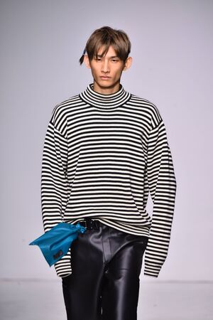 NEW YORK, NY - JULY 11: A model walks the runway at the Patrik Ervell show during NYFW: Mens July 2017 at Skylight Clarkson Sq on July 11, 2017 in New York City.のeditorial素材