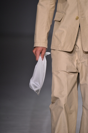 NEW YORK, NY - JULY 11: A model walks the runway at the Patrik Ervell show during NYFW: Mens July 2017 at Skylight Clarkson Sq on July 11, 2017 in New York City.のeditorial素材