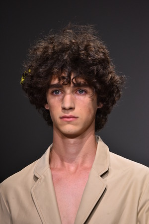 NEW YORK, NY - JULY 11: A model walks the runway at the Patrik Ervell show during NYFW: Mens July 2017 at Skylight Clarkson Sq on July 11, 2017 in New York City.のeditorial素材