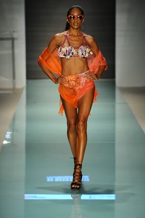 MIAMI, FL - JULY 20: A model walks the runway during the Miami International University of Arts and Design Fashion Show During Funkshion 2017 at the Funkshion tent at Miami Beach on July 20th, 2017.のeditorial素材