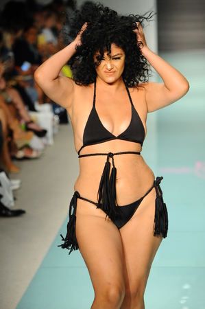 MIAMI, FL - JULY 20: A model walks the runway during  Courtney Allegra fashion show for Funkshion Miami Swim Week on July 20, 2017.のeditorial素材