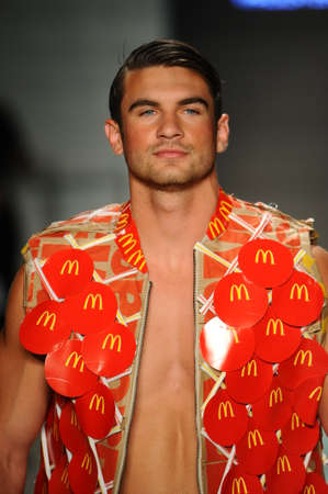 MIAMI, FL - JULY 20: A model walks the runway at McDCouture Makes A Splash At Miami Swim Week at...