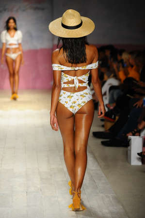 MIAMI, FL - JULY 21: A model walks the runway at the For Love And Lemons fashion show during Funkshion Swim Fashion Week at the Funkshion Tent on July 21, 2017 in Miami Beach, Florida.のeditorial素材