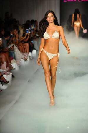 MIAMI, FL - JULY 21: A model walks the runway at the Beach Bunny  fashion show during Funkshion Swim Fashion Week at the Funkshion Tent on July 21, 2017 in Miami Beach, Florida.のeditorial素材