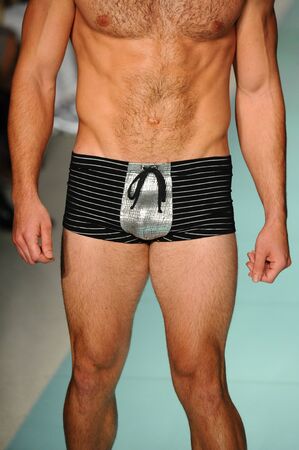 MIAMI, FL - JULY 20: A model walks the runway during Mr Tripple X  fashion show for Funkshion Miami Swim Week on July 20, 2017.のeditorial素材