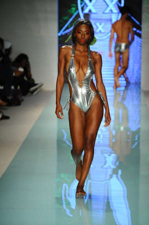 MIAMI, FL - JULY 20: A model walks the runway during Mr Tripple X  fashion show for Funkshion Miami Swim Week on July 20, 2017.のeditorial素材