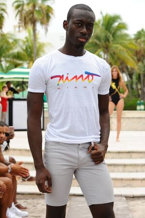 MIAMI BEACH, FL - JULY 22: A model walks the runway at Nino Apparel fashion show during Miami Splash : Dive Into Fashion V Swimwear Showcase on July 22, 2017 in Miami Beach, Florida.のeditorial素材