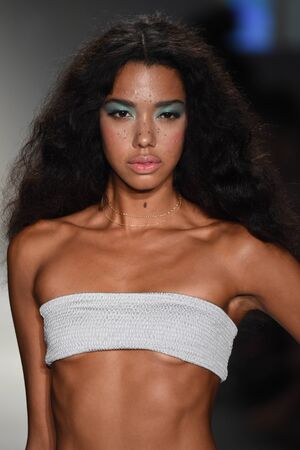 MIAMI BEACH, FL - JULY 23: A model walks the runway at SWIMMIAMI Indah 2018 Collection at SWIMMIAMI tent on July 23, 2017 in Miami Beach, Florida.のeditorial素材