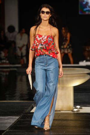 MIAMI, FL - JULY 21: A model walks the runway at the 7th annual  Style Saves Swim Fashion Show in Setai Hotel on July 21, 2017 in Miami Beach, Florida.のeditorial素材