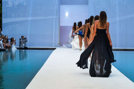 MIAMI BEACH, FL - JULY 22: Models walk the runway finale at SWIMMIAMI Gottex Cruise 2018 Fashion Show at WET Deck at W South Beach on July 22, 2017 in Miami Beach, Florida.のeditorial素材