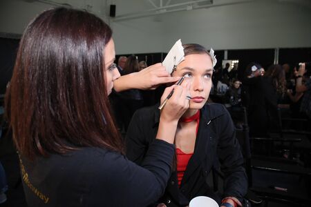NEW YORK, NY - SEPTEMBER 06: A model getting ready backstage before the Pamella Roland Spring 2018 Collection during New York Fashion Week at Pier 59 on September 6, 2017 in New York City.のeditorial素材