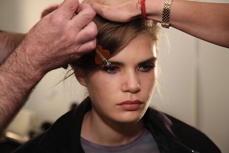 NEW YORK, NY - SEPTEMBER 07: A model getting ready backstage before the Brock Collection fashion show during New York Fashion Week on September 7, 2017 in New York City.のeditorial素材