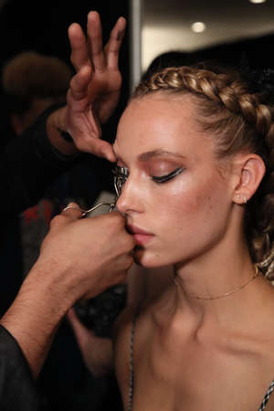 NEW YORK, NY - SEPTEMBER 09: A model getting ready backstage for the Philipp Plein fashion show...