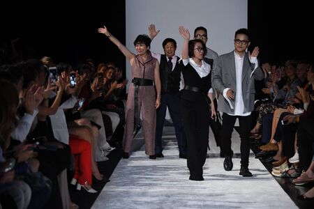 NEW YORK, NY - SEPTEMBER 10:  Design team members walk the runway at the Naersi fashion show during...