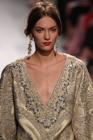 NEW YORK, NY - SEPTEMBER 12: A model walks the runway at the Badgley Mischka fashion show during New...