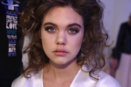 New York, NY, USA - October 7, 2017: A model posing backstage before  Julie Vino Havana 2018 Bridal Collection runway show at 404 10th Avenue during New York Bridal week, New York City.のeditorial素材