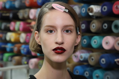 New York, NY, USA - October 6, 2017: A model posing backstage before the Naeem Khan Bridal 2018 Collection runway show during New York Bridal week, New York City.のeditorial素材