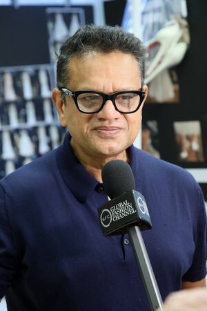 New York, NY, USA - October 6, 2017: Designer Naeem Khan giving away interview backstage before the Naeem Khan Bridal 2018 Collection runway show during New York Bridal week, New York City.のeditorial素材