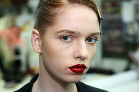 New York, NY, USA - October 6, 2017: A model posing backstage before the Naeem Khan Bridal 2018 Collection runway show during New York Bridal week, New York City.のeditorial素材