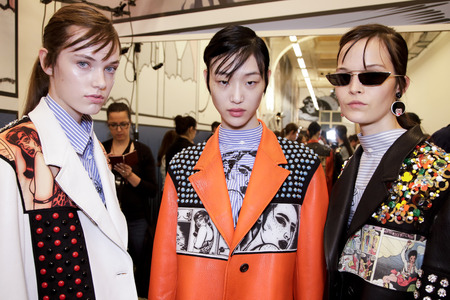 MILAN, ITALY - SEPTEMBER 21: Models are seen backstage before the Prada show during Milan Fashion...