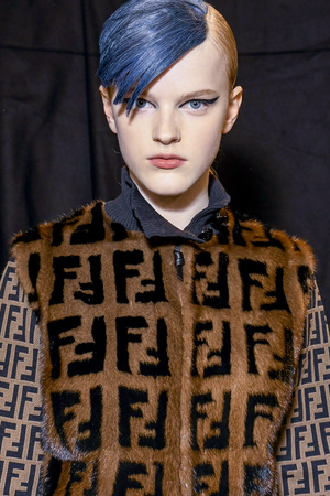 MILAN, ITALY - SEPTEMBER 21: A model is seen backstage ahead of the Fendi show during Milan Fashion...