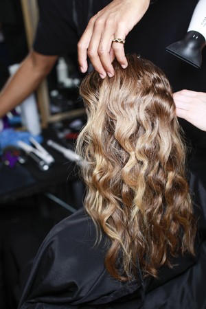 MILAN, ITALY - SEPTEMBER 21: A model getting readybackstage before the Vivetta show during Milan Fashion Week Spring/Summer 2018 on September 21, 2017 in Milan, Italy.のeditorial素材